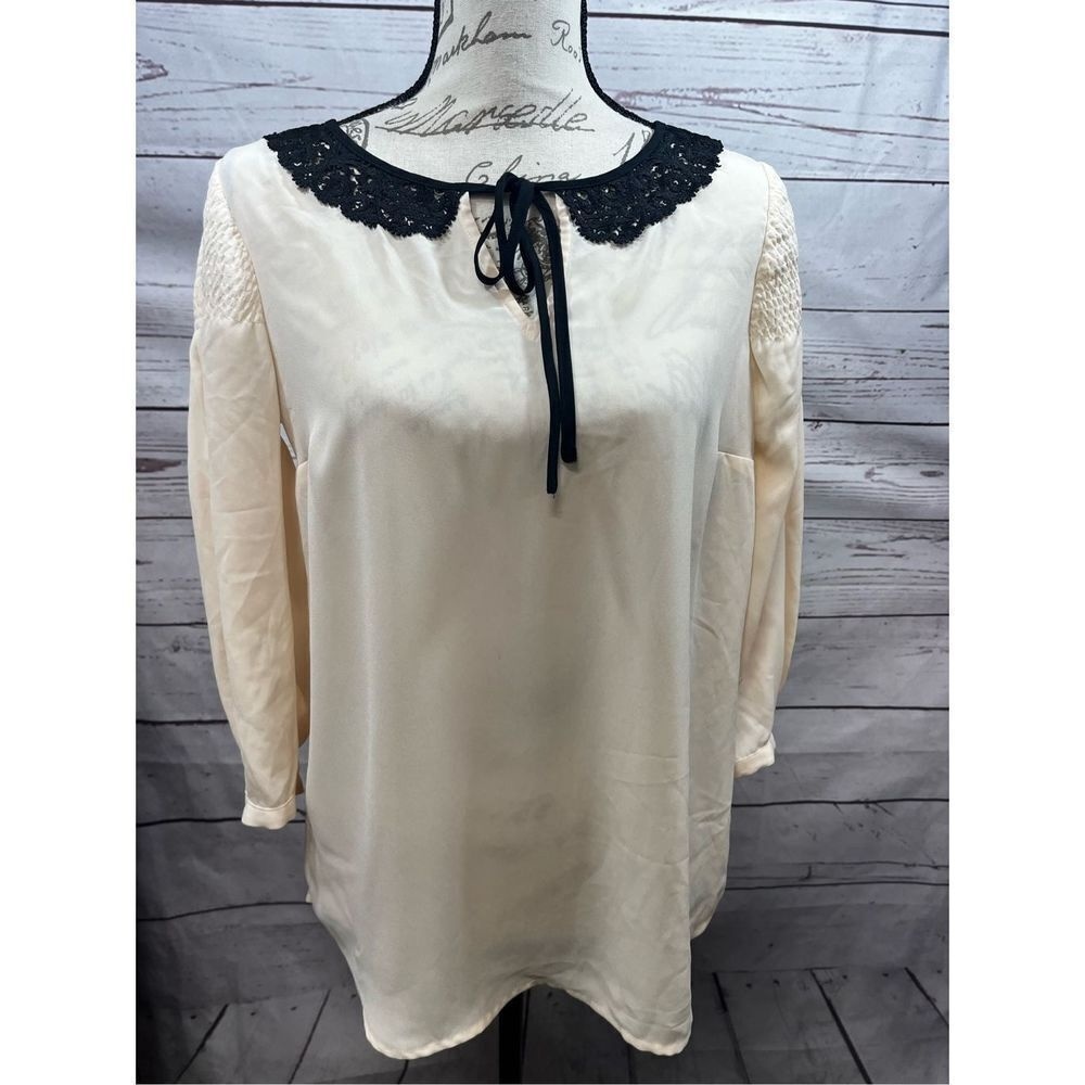Disney - a collection by Lauren Conrad - small off white blouse with black lace